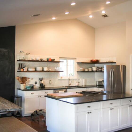 Open Plan Kitchen And Dining With Chalkboard Wall